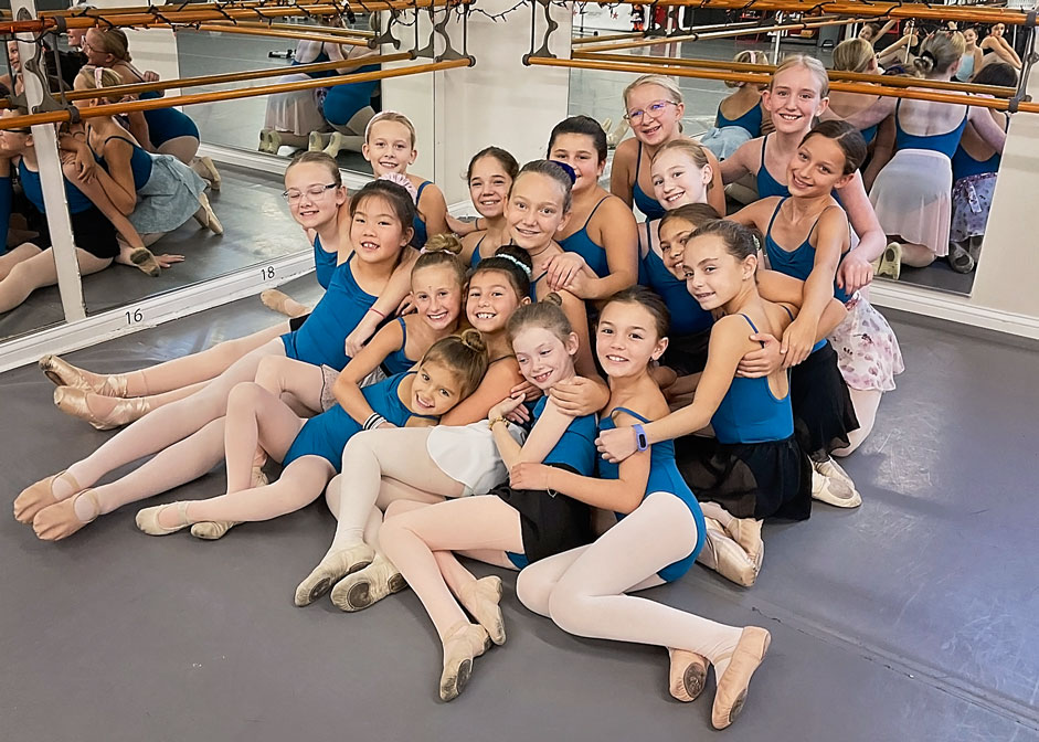 Girls from a Debra Sparks dance class posing for a group photo